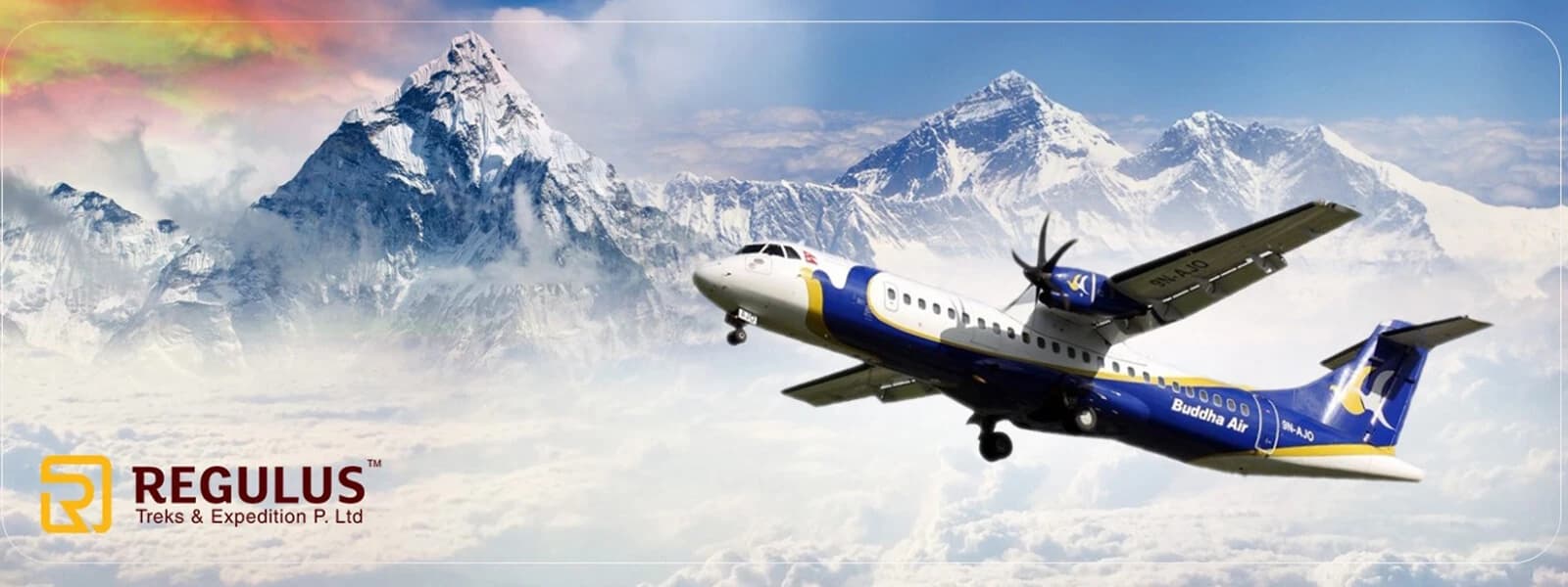 A scenic mountain fliAn airplane of Buddha air flying close to the Himalayas, offering a clear view of snow-capped peaks.
