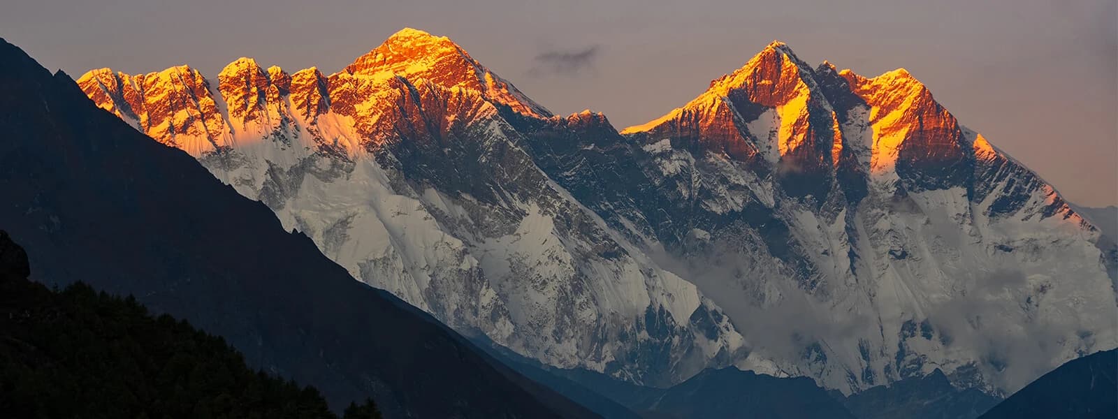 Golden sunrise illuminating the Himalayan peaks during the Everest Base Camp 14-day trek