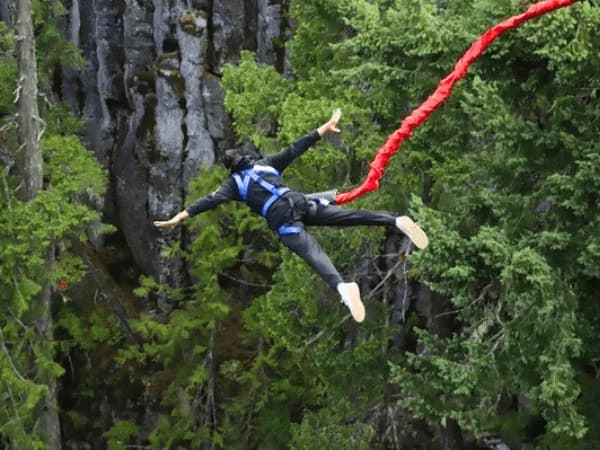 Traveler enjoying a thrilling bungee jump in Pokhara, Nepal — a top adventure destination for adrenaline seekers.