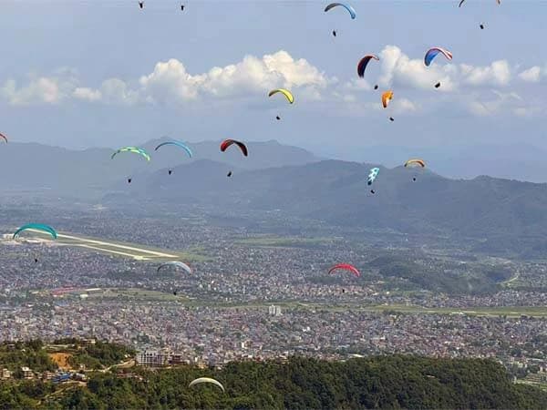 Paragliding over Phewa Lake in Pokhara, Nepal