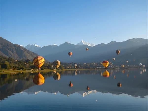 Scenic hot air balloon ride over Pokhara Valley included in adventure combo package.